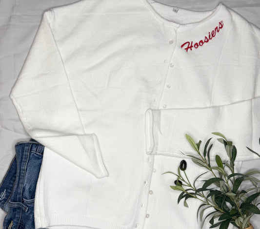 White cardigan with 'Hoosiers' embroidery near collar
