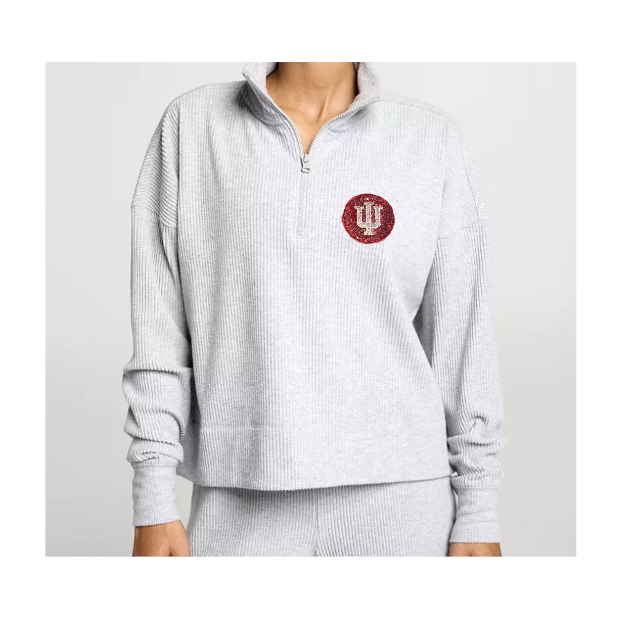 Light gray ribbed sweater with a red and white IU logo with a red sequin background. Pic is showing the style of the sweatshirt