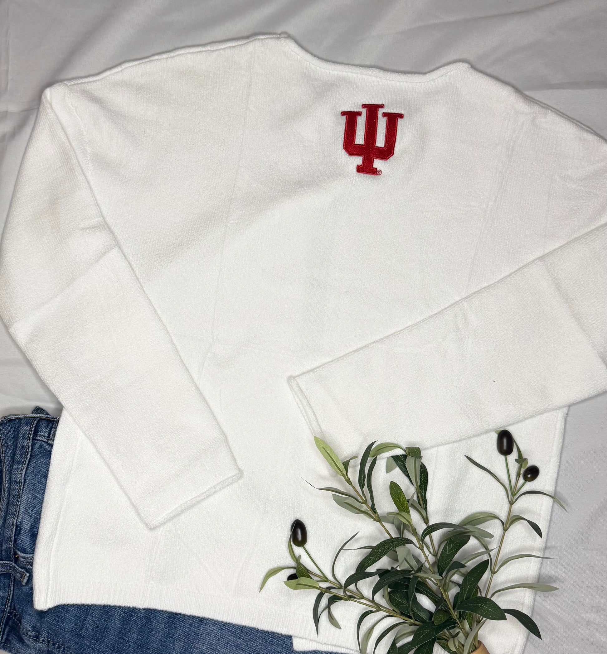 White sweatshirt with red IU trident on the center/back
