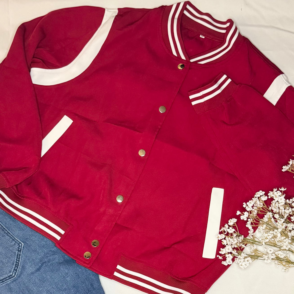 Red varsity jacket with white accents